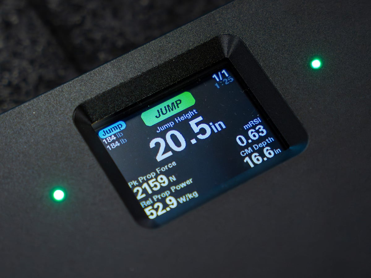 OVR Force plate with its on-device screen showing a jump result
