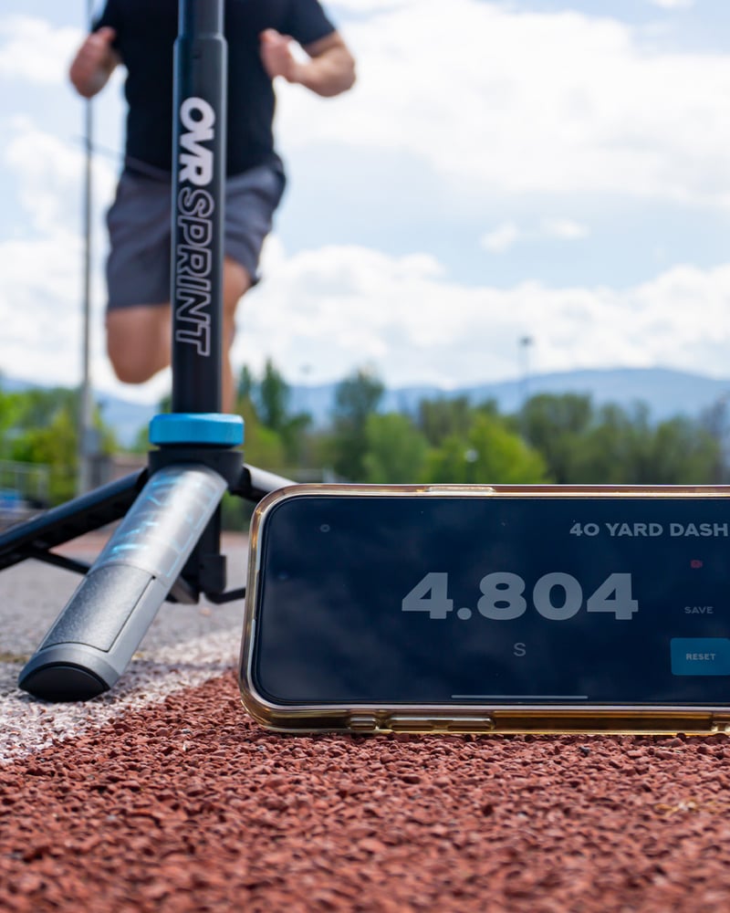 Athlete crossing the OVR Sprint gate at full speed