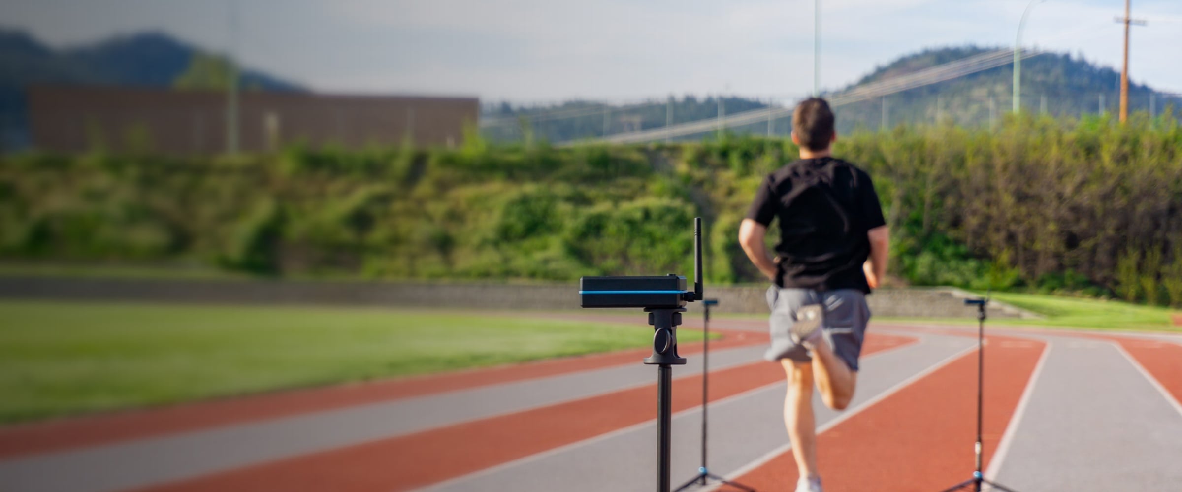 Athlete sprinting past OVR Sprint gates