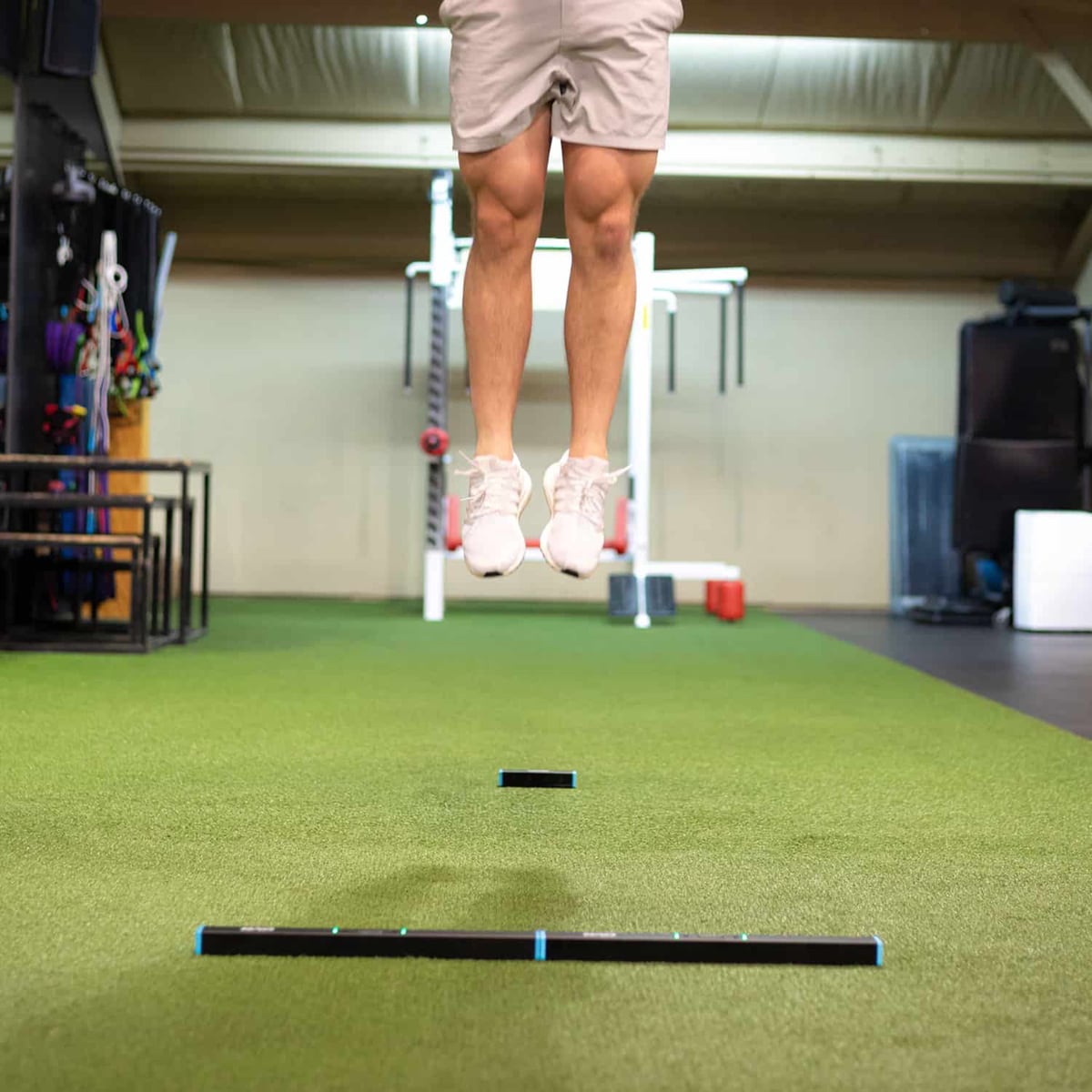 Performance coach running a vertical jump test with OVR Jump