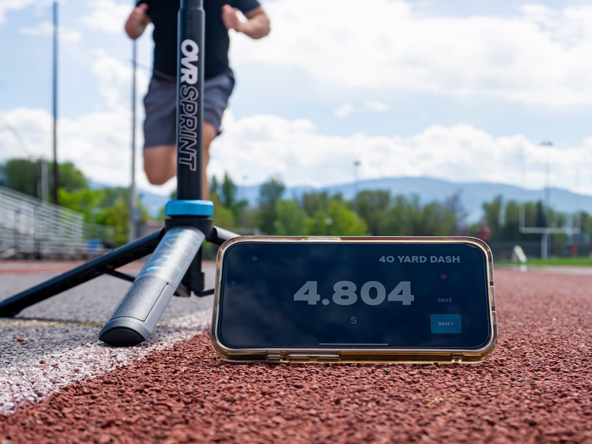 Athlete timing their own sprint with OVR Sprint gates.